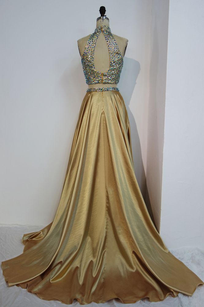 MISSHOW offers Floor Length A-line Two-piece Halter Prom Dresses with Crystals at a cheap price from Gold, Stretch Satin to A-line,Two Pieces Floor-length hem. Stunning yet affordable Sleeveless Realdressphotos.