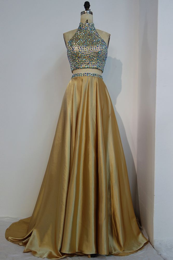 MISSHOW offers Floor Length A-line Two-piece Halter Prom Dresses with Crystals at a cheap price from Gold, Stretch Satin to A-line,Two Pieces Floor-length hem. Stunning yet affordable Sleeveless Realdressphotos.