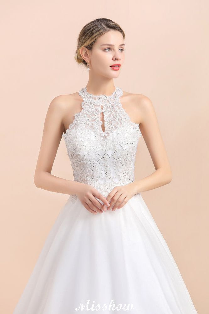 Looking for  in Tulle, A-line style, and Gorgeous Rhinestone work  MISSHOW has all covered on this elegant Gorgeous Halter Rhinstones Wedding Dress White Tulle Lace Appliques Aline Bridal Gown