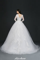 This elegant Jewel Tulle wedding dress with Appliques could be custom made in plus size for curvy women. Plus size Long Sleeves Ball Gown bridal gowns are classic yet cheap.