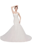 This beautiful Ivory Tulle Sweetheart Mermaid Strapless Wedding Dresses with Lace-up will make your guests say wow. The Strapless,Sweetheart bodice is thoughtfully lined, and the Floor-length skirt with Ruffles to provide the airy, flatter look of 100D Chiffon,Tulle.