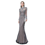 The gorgeous Luxury Sparkly beading High Neck Sheer Tulle Long Prom Dress will stun every girl. The Tulle Vintage Party dress will add extra elegance to your wholesale look.