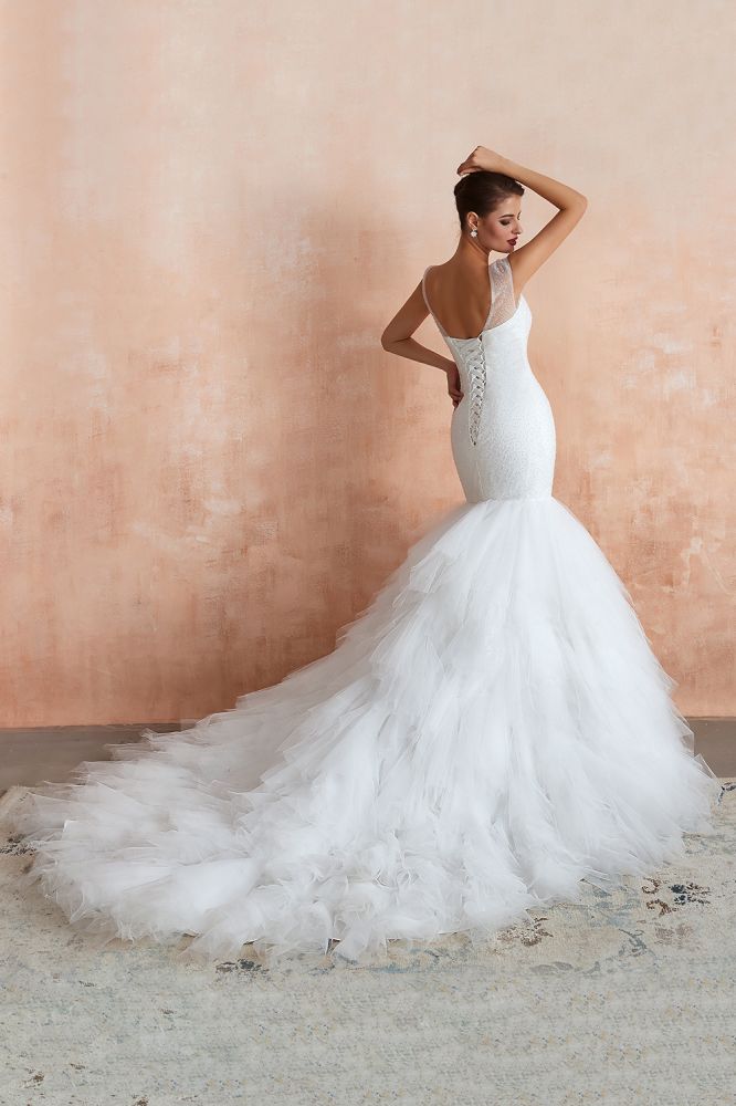This elegant V-neck Tulle wedding dress with Beading,Sequined could be custom made in plus size for curvy women. Plus size Sleeveless Mermaid bridal gowns are classic yet cheap.