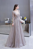 Looking for Prom Dresses,Evening Dresses,Homecoming Dresses,Quinceanera dresses in Tulle,Lace, A-line style, and Gorgeous Draped,Pearls,Sequined,Rhinestone work  MISSHOW has all covered on this elegant Modest Long Sleeves V-Neck Princess Prom Dress Sequined Aline Party Gown.