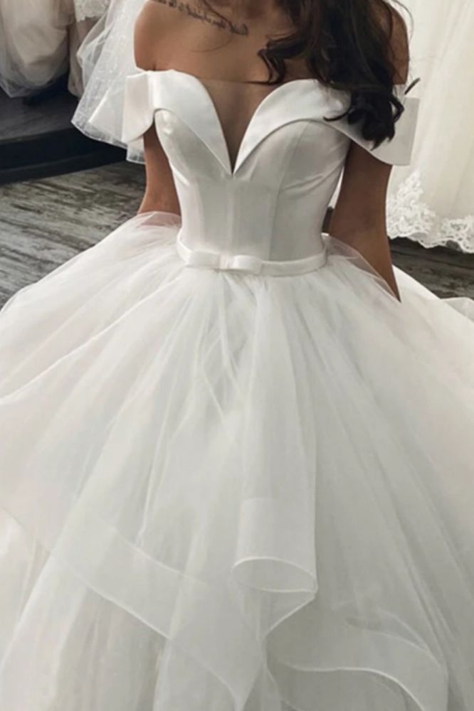 Find this Chic Deep V-neck White Wedding Dressat Misshow, available in everyone color and size you could possibly imagine, which makes picking out the perfect prom dress for your big day easily!
