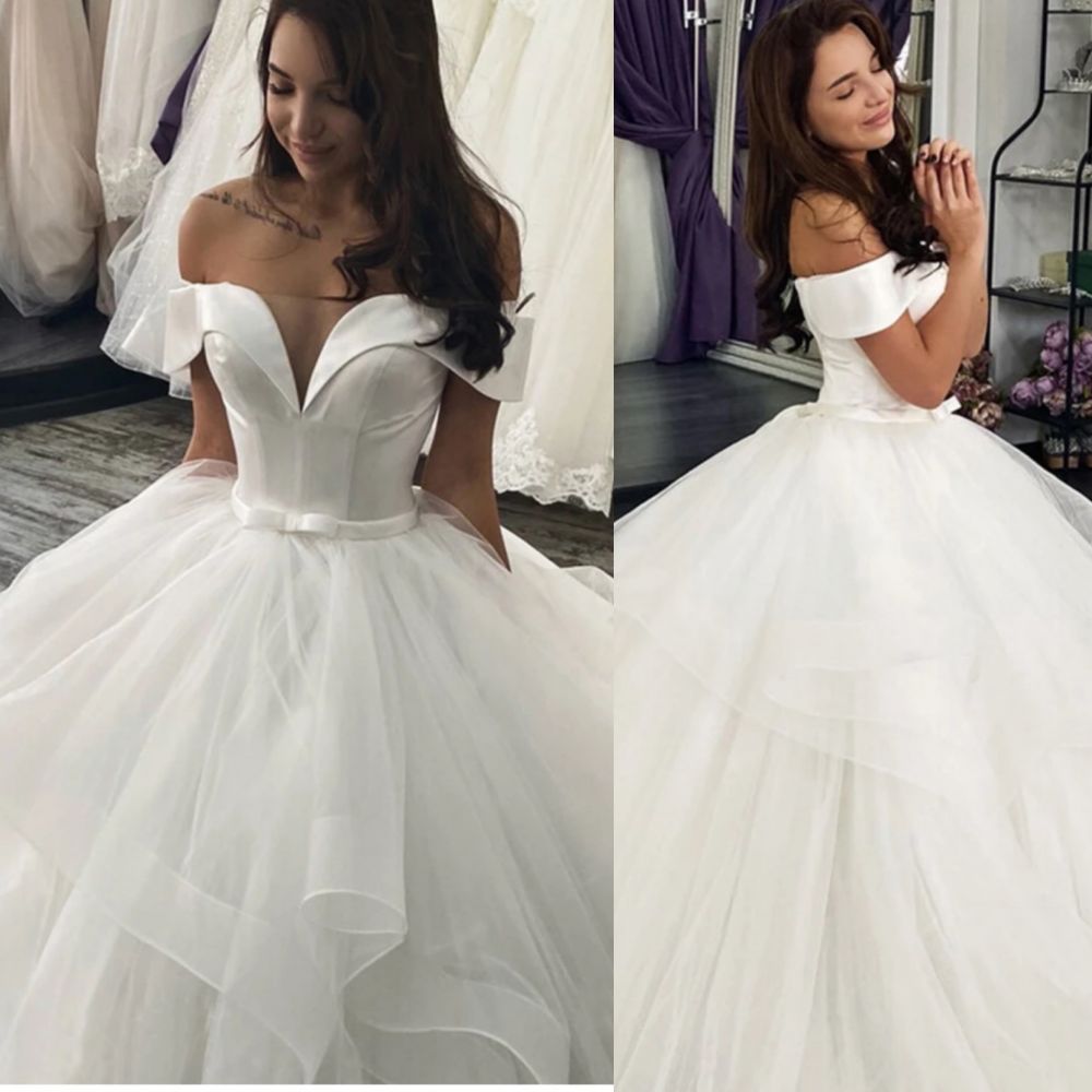 Find this Chic Deep V-neck White Wedding Dressat Misshow, available in everyone color and size you could possibly imagine, which makes picking out the perfect prom dress for your big day easily!