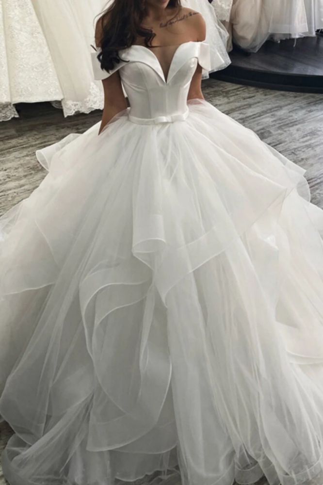 Find this Chic Deep V-neck White Wedding Dressat Misshow, available in everyone color and size you could possibly imagine, which makes picking out the perfect prom dress for your big day easily!