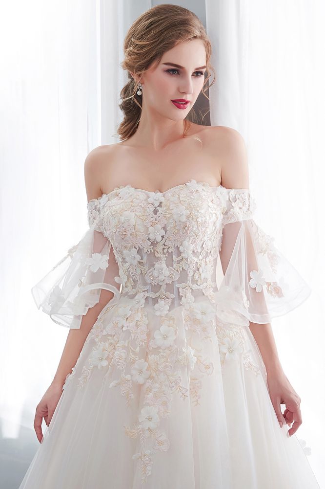 Looking for  in Satin,Tulle, A-line style, and Gorgeous Appliques work  MISSHOW has all covered on this elegant NANCE, Off-the-shoulder Aline Ball Gown Floor Length Appliques Tulle Wedding Dress