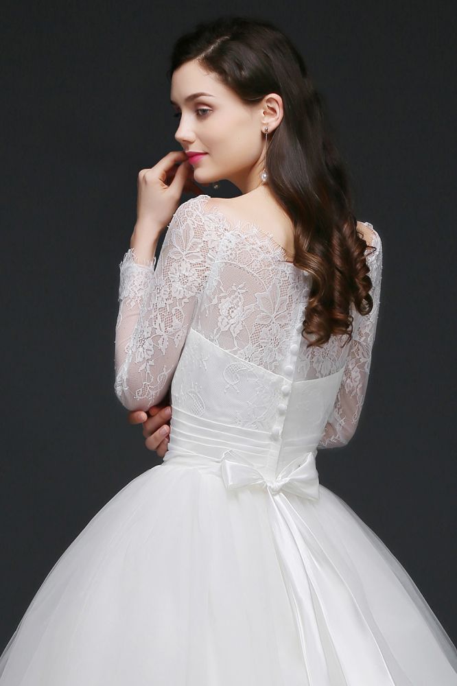 This elegant Scoop Tulle wedding dress with Lace could be custom made in plus size for curvy women. Plus size Long Sleeves Princess bridal gowns are classic yet cheap.