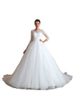 Looking for  in Tulle, A-line,Ball Gown,Princess style, and Gorgeous Lace work  MISSHOW has all covered on this elegant Romantic Long Sleeve Lace Ball Gown Tulle Fully Covered Buttons Aline Wedding Dress with Court Train