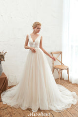 This elegant V-neck Tulle wedding dress with Lace,Beading,Rhinestone could be custom made in plus size for curvy women. Plus size Sleeveless A-line,Ball Gown bridal gowns are classic yet cheap.