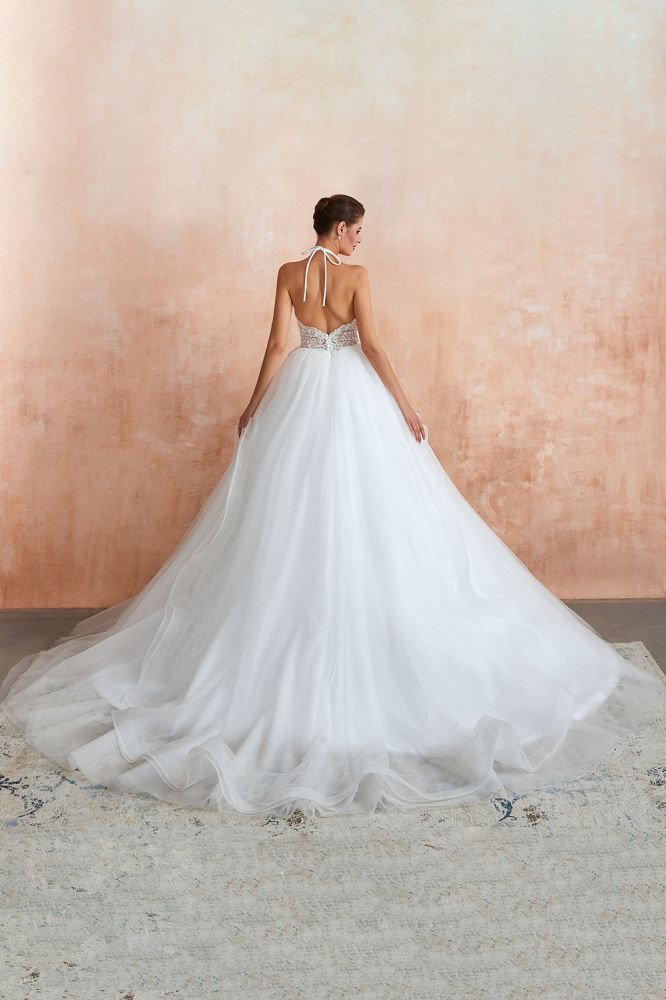 This elegant Halter Tulle wedding dress with Lace,Sequined could be custom made in plus size for curvy women. Plus size Sleeveless A-line,Ball Gown,Princess bridal gowns are classic yet cheap.