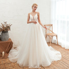 Looking for  in Tulle, A-line,Ball Gown style, and Gorgeous Beading,Flower(s) work  MISSHOW has all covered on this elegant Spaghetti Straps Plunging V-Neck Wedding Dress Low Back Champagne Bridal Gown
