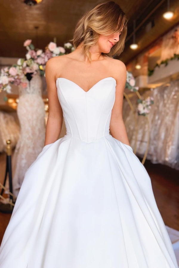 Satin Sleeveless Sweetheart A Line Wedding Dress With Pockets Satin Sleeveless Sweetheart A Line Wedding Dress With Pockets