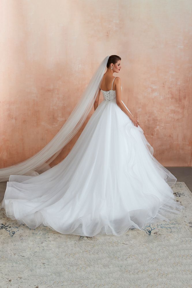 This elegant V-neck,Spaghetti Straps Tulle wedding dress with Lace could be custom made in plus size for curvy women. Plus size Sleeveless A-line,Ball Gown,Princess bridal gowns are classic yet cheap.